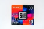 Sony 80 Minute Blank Media Minidisc 10-PACK Color Collection Transparent Backs. Fixed Price $109.95.
