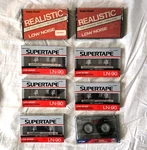 8 X Realistic Supertape Blank Cassette Tapes Sealed Low Noise Radio Shack. Fixed Price $28.00.