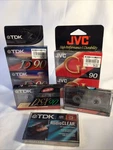 Of 6 Various Cassette Tapes And One Tdk Dry Audio Head Cleaner, All Sealed. Fixed Price $17.99.