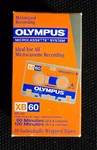 8 Sealed Vintage Olympus Microcassette Recording Tapes. Fixed Price $45.00.