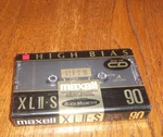 New Maxell High Bias Xlii 60 Minute Audio Cassette Tape Sealed - Black Magnetite. Fixed Price $9.99.