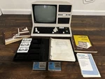 Radio Shack Tandy TRS-80 Model 4 Microcomputer W/ Manual, Books, 5 Cassettes. Fixed Price $650.00.