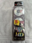 Fuji 15 Pack Color 80 Blank Minidiscs Factory Sealed With Storage Cases. Fixed Price $90.00.